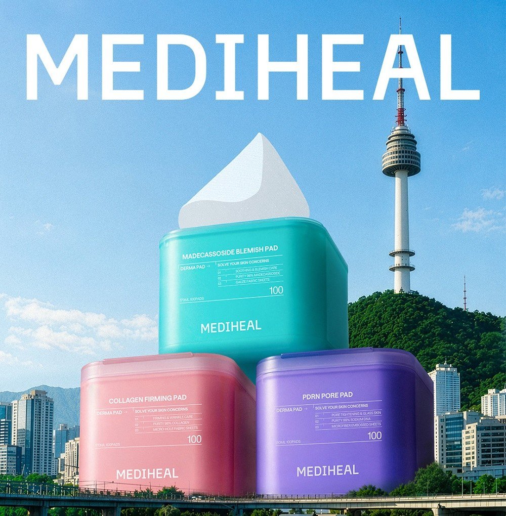 Three Mediheal Seoul Edition derma pad tubs in teal, pink and purple stacked in front of Namsan Seoul Tower
